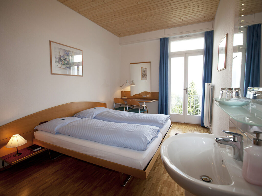Doppelzimmer Süd Budget mit Balkon - Weisses Haus